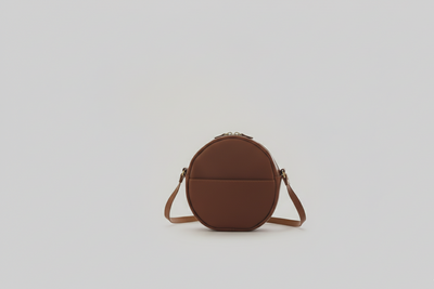 L’Élégance Artisanale : Petit Sac Rond en Cuir (20 cm)
